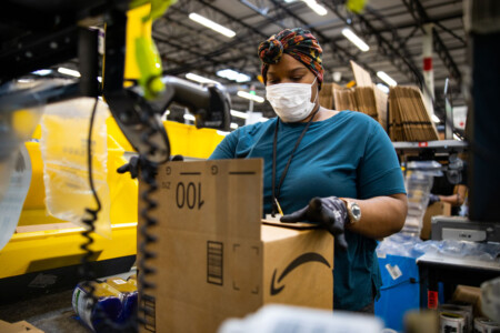 Amazon Hiring for 150,000 Seasonal Jobs Amazon Associate wearing PPE Metropolitan Airport News