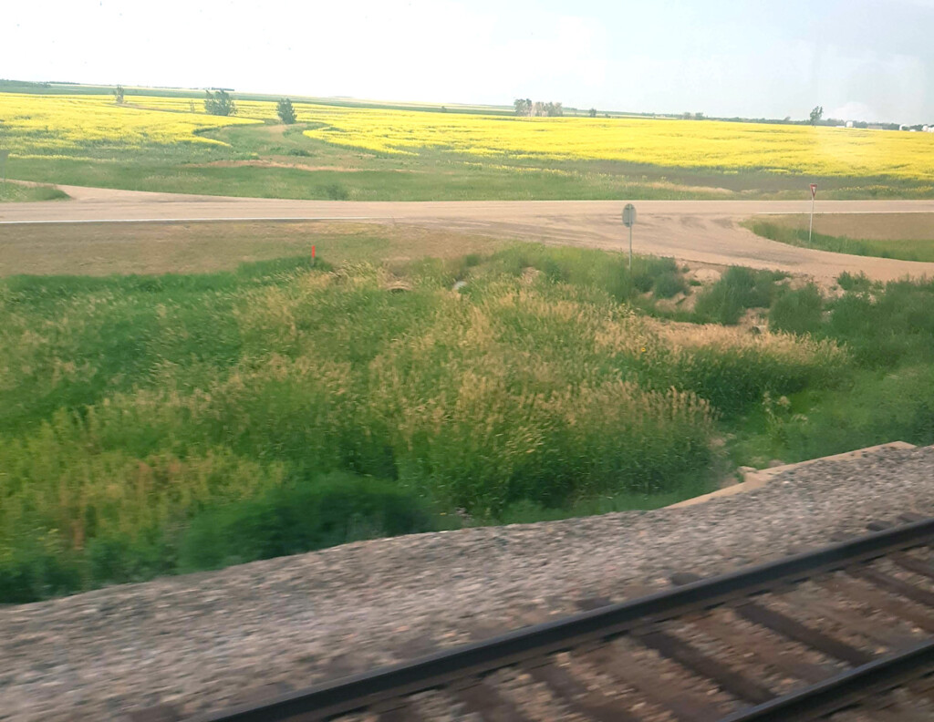 Trains, Planes,and Automobiles – Looking for America New York Airport Big Sky Country, Montana, a railroad view.