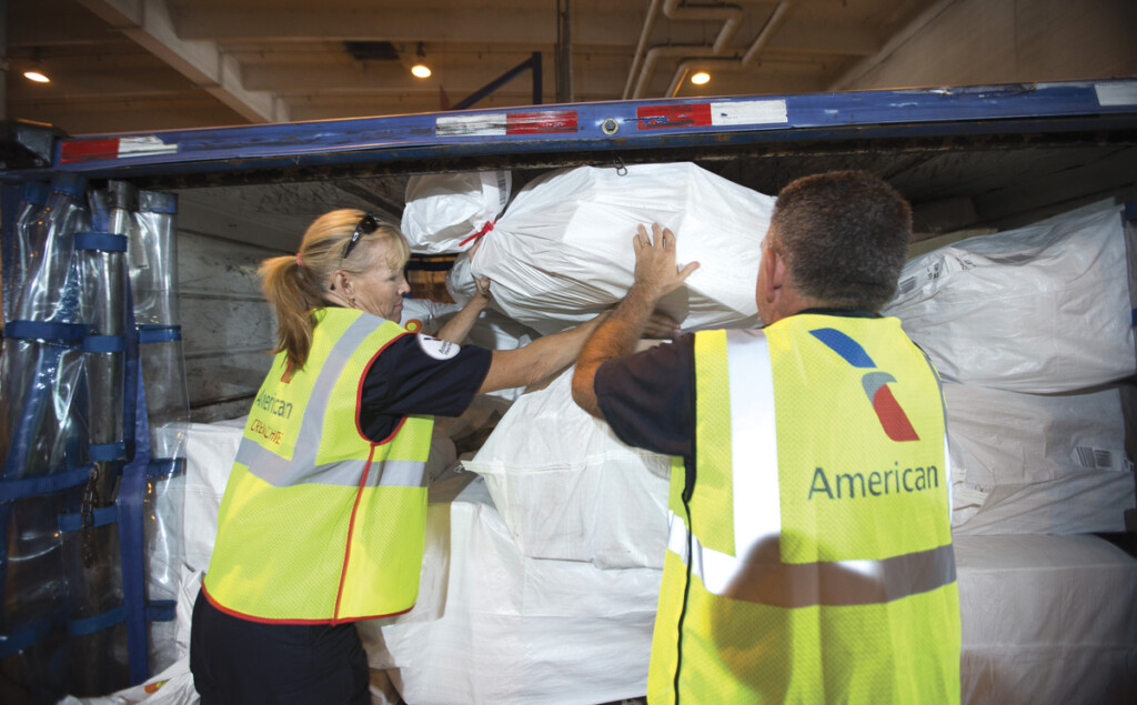 Women in Air Cargo New York Airport Cargo Employees Loading Cargo.