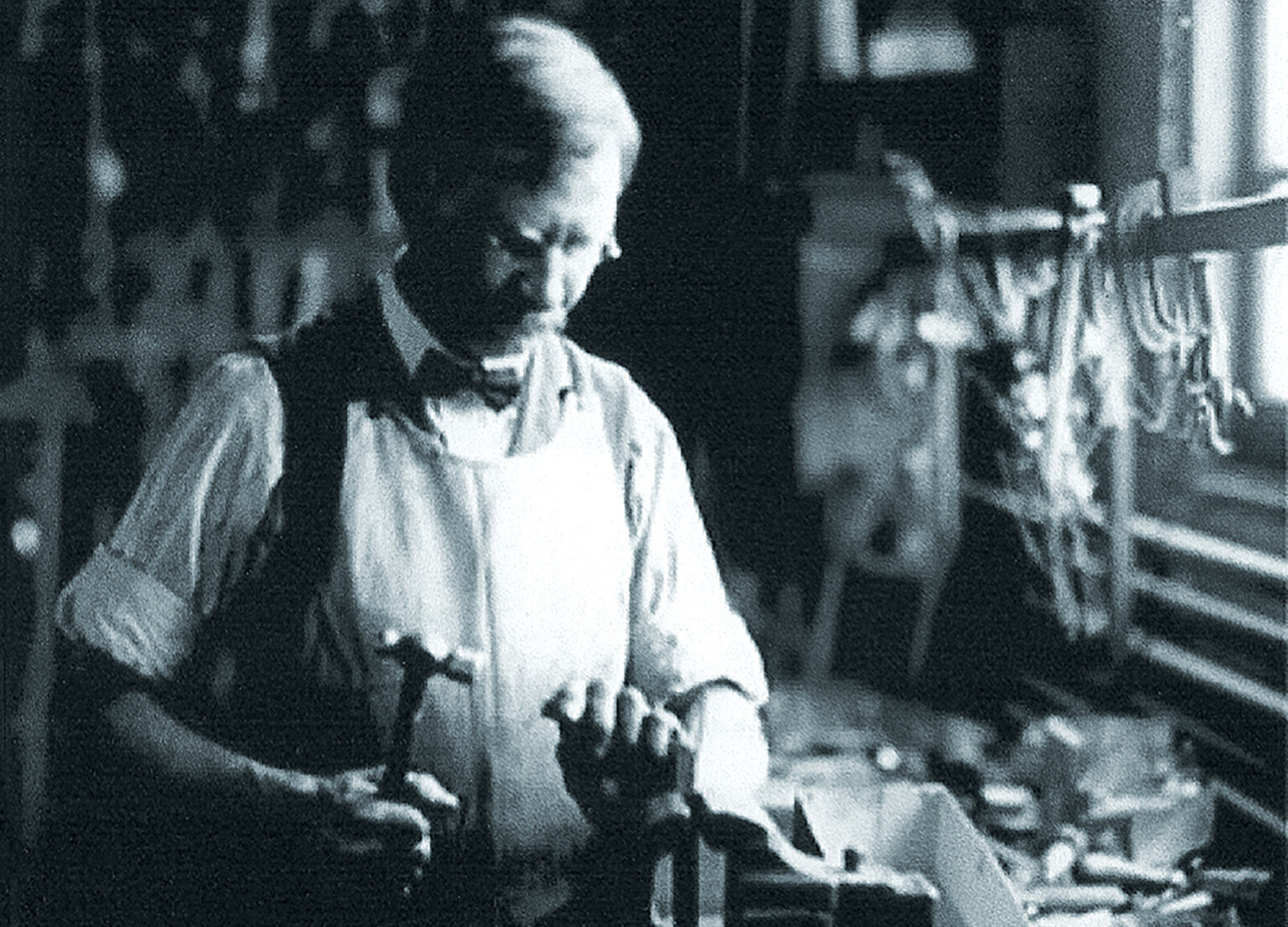 Finding Charlie Charles Taylor in his workshop c.1911