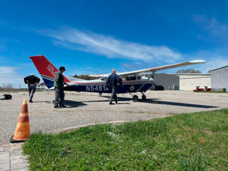 With Eyes to Future, Civil Air Patrol Puts Mission to Work for Long Island CAP aircrew carrying out preflight checks before a training mission from Long Island MacArthur Airport in a Cessna U206 Stationair.