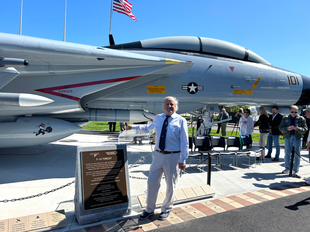 F-14D Tomcat ‘Felix 101’ Comes Home New York Airport Curator Josh Stoff beside bronze marker Metropolitan Airport News