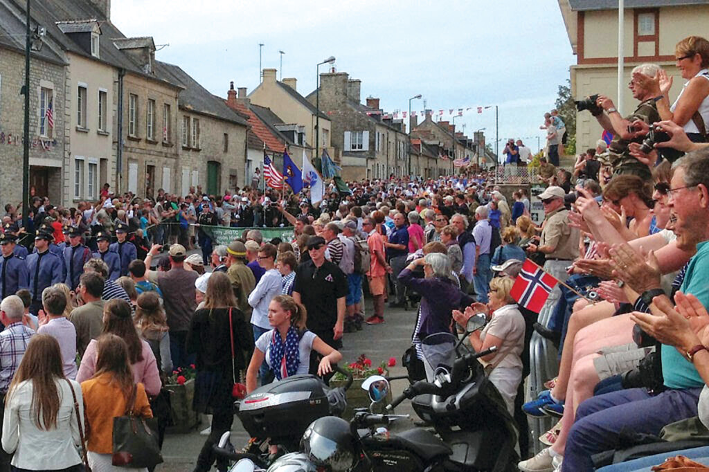 D-Day: The Day Each Year Europe Celebrates The Beginning of Their Liberation New York Airport The streets of Ste. Marie Eglise are filled as D-Day Task Force members march into town.