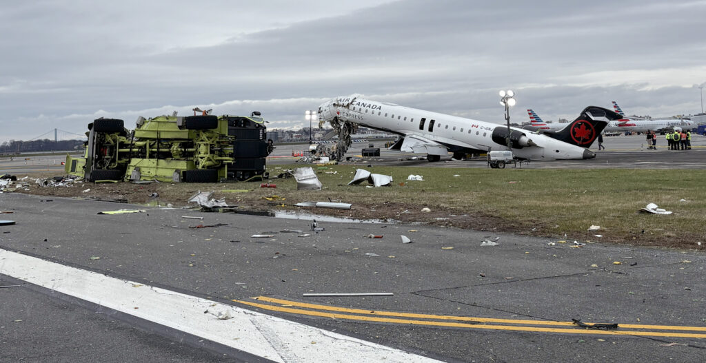 Runway Safety in the Drone Age New York Airport The aftermath of Jazz Aviation (operating as Air Canada Express) Flight 8646 following its runway collision with an airport fire truck.