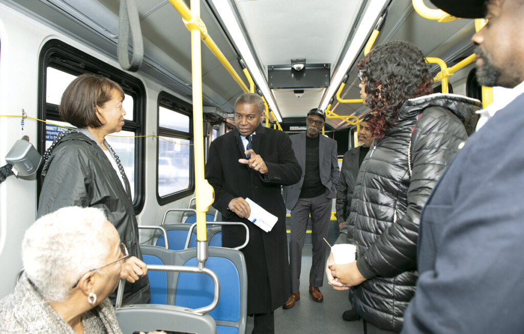 The New Terminal One at JFK New York Airport Dr. Gerrard Bushell tours the first electric bus in the Cauley Coach Fleet.