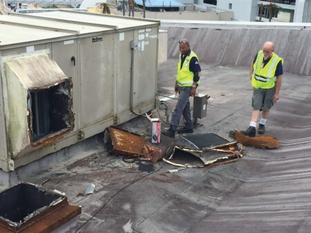 Puerto Rico Hurricane Recovery Status FEATURE PUERTO RICO12 HURRICANE PA EMPLOYEES SURVEYING ROOFTOP DAMAGE AT SAN JUAN AIRPORT Metropolitan Airport News