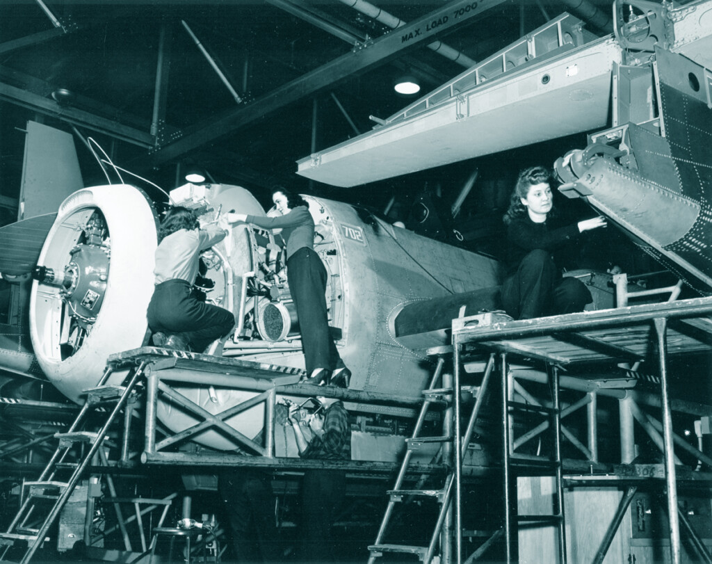 Wing Women: Women in Aviation New York Airport Grumman women workers assembling forward firewall for aircraft 1943.