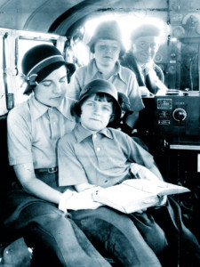 The Flying Hutchinsons New York Airport (Front to Rear) Janet Lee on lap of Blanche Hutchinson, Kathryn, George Hutchinson.
