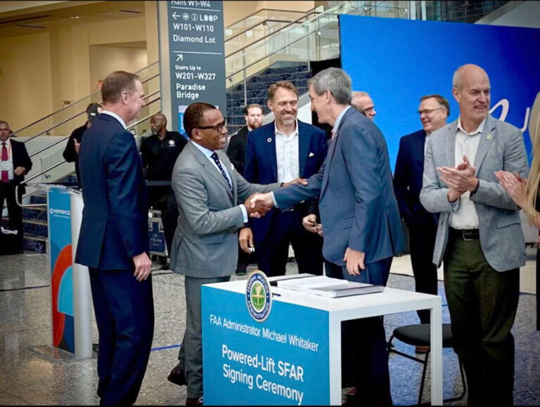 Archer Applauds FAA’s Final Rules for Operating eVTOL Aircraft Former FAA Administrator and current Archer Chief Regulatory Affairs Officer, Billy Nolen, shakes hands with current FAA Administrator, Mike Whitaker, shortly after the final powered-lift SFAR is signed.