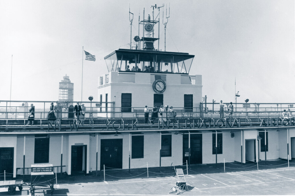 PANYNJ Celebrates 100th Anniversary New York Airport Idlewild-Kennedy First Control Tower built 1946. Background shows skeleton of 2nd Control Tower. (nyheritage.org/cradle of aviation)