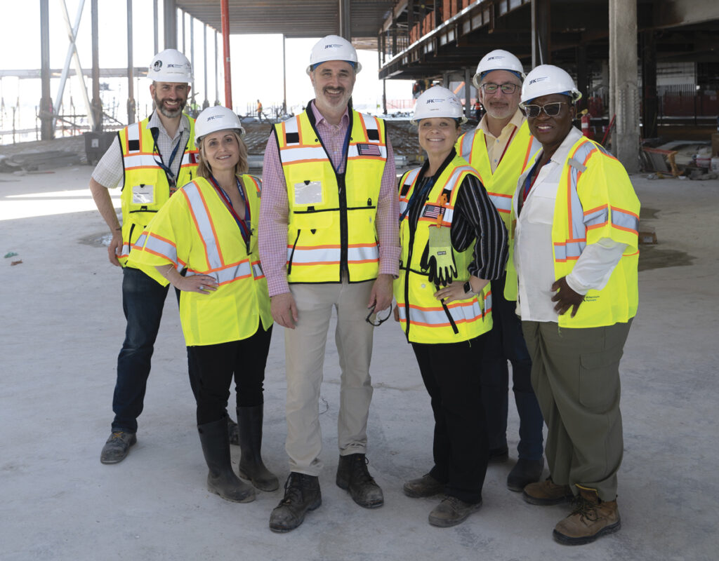(L.-R.): John Girardi, Deputy Director, Design & Construction; Jennifer Janzen, Communications Director; Derek Thielmann, Vice President, Design & Construction / Project Director; Kasia Sek, Director, Operations Planning & Implementation; Ed Ratuski, Acting COO;  
Sade Olanipekun-Lewis, Vice President, Operating & Community Partnerships.