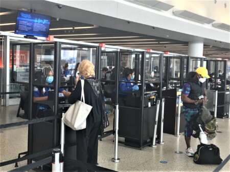 TSA is installing acrylic barriers at John F. Kennedy International Airport to help protect passengers and workforce from coronavirus