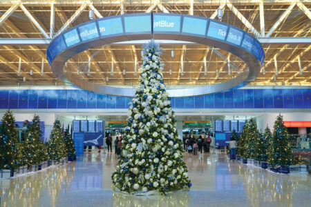A Canvas for Holiday Cheer & Giving JetBlue JFK Airport decorated for the Holidays.