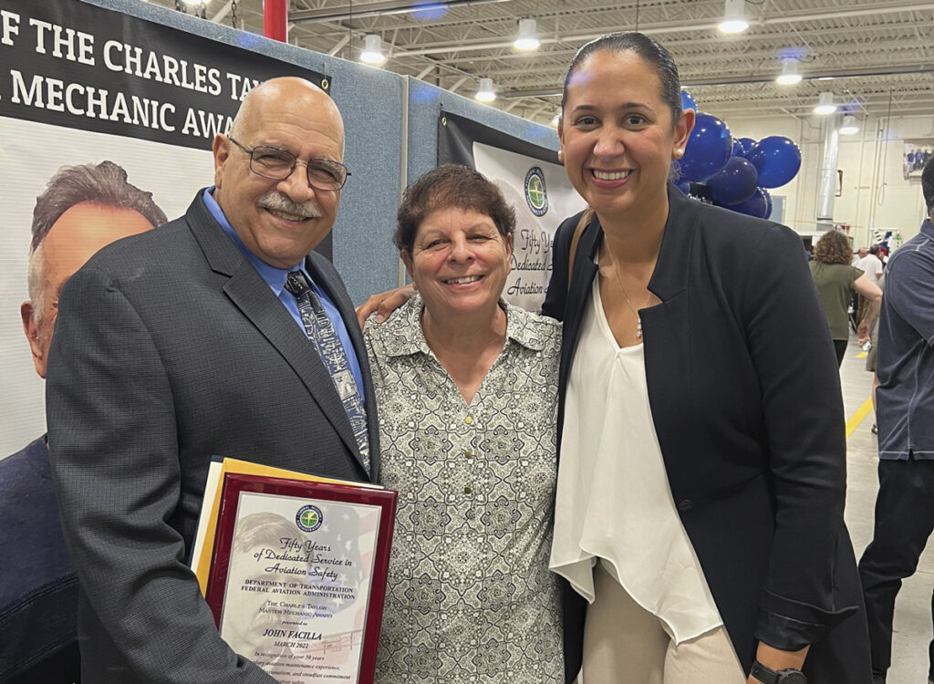 John Facilla with his wife, Josephine, and Evita Garces.