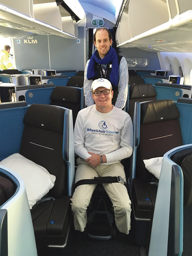 John Morris boarding in an aisle chair.