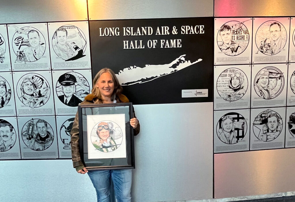 Julia Lauria-Blum with the Jacqueline Cochran Portrait at the Aviation Hall of Fame