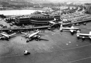 LaGuardia-view-of-field-side-aircraft-ops-with-Central-Terminal-Observation-Deck-&-adjacent-parking-8-17-1951 New York Airport LaGuardia view of field side aircraft ops with Central Terminal Observation Deck adjacent parking 8 17 1951 Metropolitan Airport News
