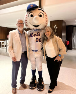 Doug Blum & Metropolitan Airport News Editor-in-Chief, Julia Lauria-Blum posing with Mr. Met during the T4 25 Years celebration at the TWA Hotel. New York Airport Doug Blum & Metropolitan Airport News Editor-in-Chief, Julia Lauria-Blum posing with Mr. Met during the T4 25 Years celebration at the TWA Hotel.