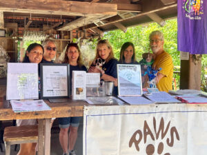 PAWS volunteers at fundraising event.