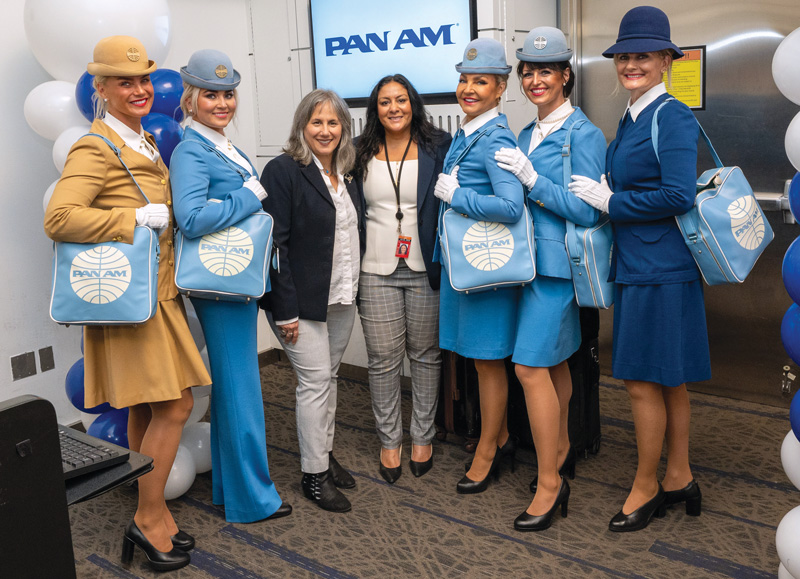 Re-Tracing the Transatlantic New York Airport Julia Lauria-Blum, Editor in Chief, Metropolitan Airport News, and Karen Ali, COO, JFK Millennium Partners, pose with the Pan Am crew before takeoff.