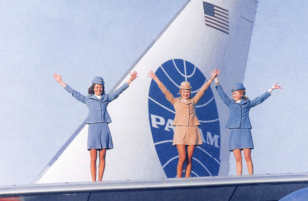Pan Am promotional-photo of stewardesses-standing on wing of a Boeing 747.