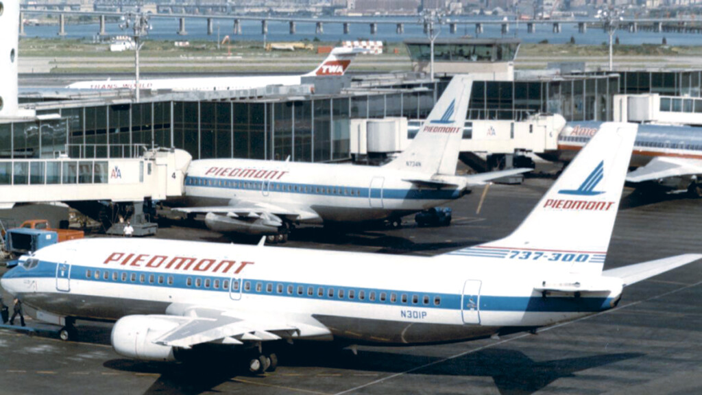 Piedmont: The Up-and-Coming Airline New York Airport A Boeing 737-200 and a Boeing 737-300
at LaGuardia Airport in August 1985.