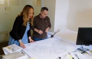 March 2022 Publisher’s Message Cheryl McKissack Daniel reviewing blueprints.