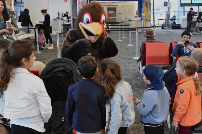 LGA Terminal B Turkey Greets Travelers LGA Terminal-B Turkey encouraging kids to eat ONLY their vegetable!