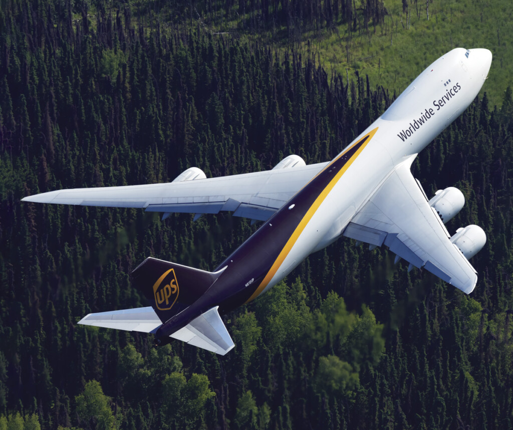 Looking Up! A Passion for Plane Spotting New York Airport An air-to-air shot taken from a helicopter of a
UPS 747-8 departing from Anchorage, Alaska.