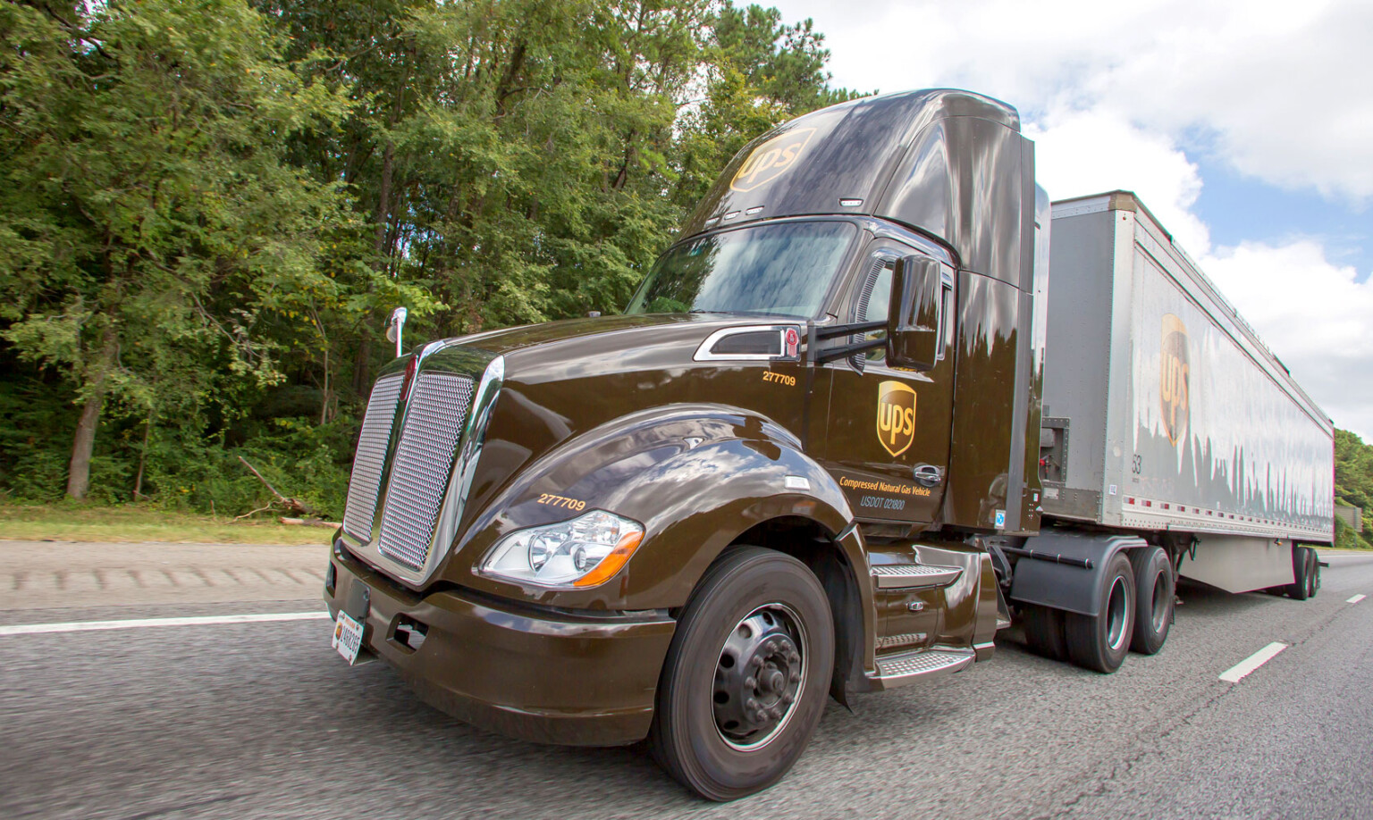 UPS Invests More Than $90 Million In Natural Gas Vehicles and Infrastructure UPS CNG tractor trailer.