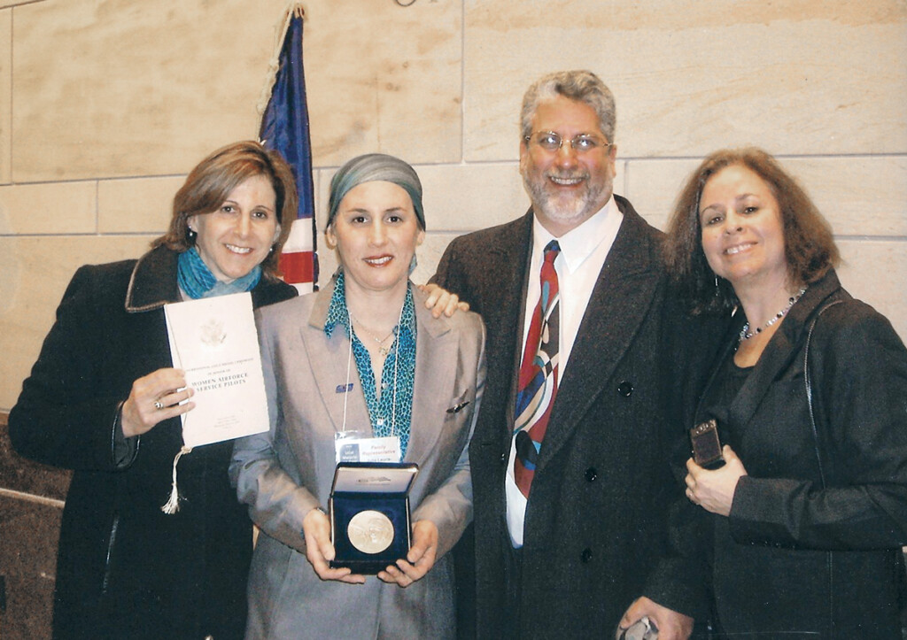 An Extraordinary Day in March Julia, at the U.S. Capitol in Washington D.C., with husband Doug and friends on March 10, 2010. Her work at the American Airpower Museum assisted in enacting Public Law 111-40-July 1, 2009, awarding the Congressional Gold Medal to the WASP, WWII.