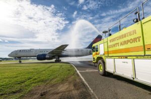 HPN Airport fire trucks give the New York Knicks a well-deserved water cannon salute as they arrive home with the trophy. New York Airport HPN Airport fire trucks give the New York Knicks a well-deserved water cannon salute as they arrive home with the trophy.
